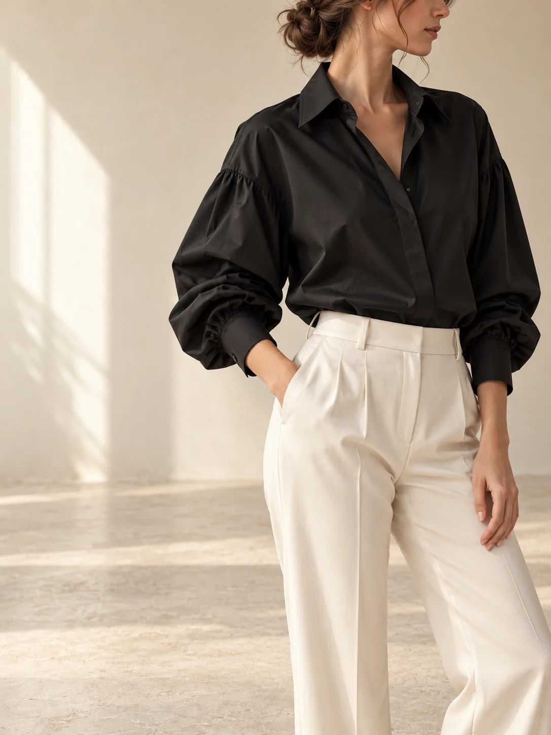 Black blouse and ivory tailored trousers concept look